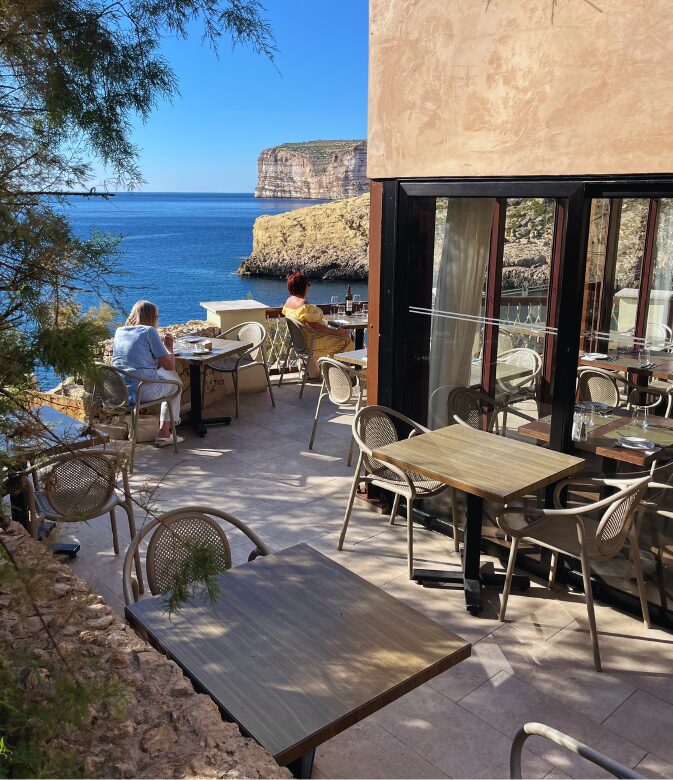 Lunch on the terrace overlooking Xlendi Bay at Terrazzo Restaurant, Gozo.