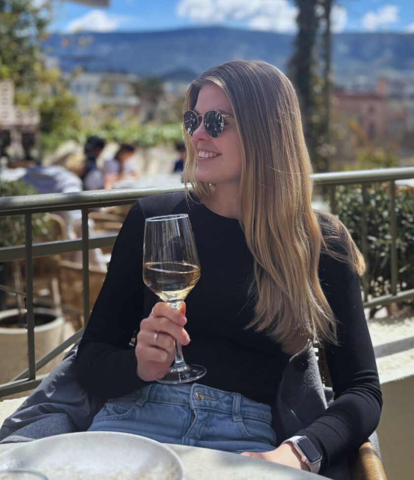 enjoying a glass of wine at thespis restaurant in athens