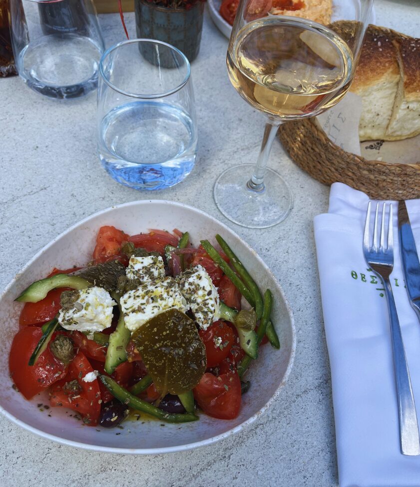 greek salad and wine at thespis restaurant